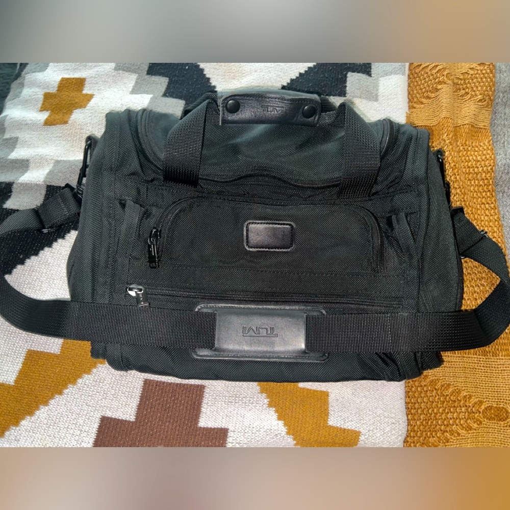 Tumi weekender duffle bag.